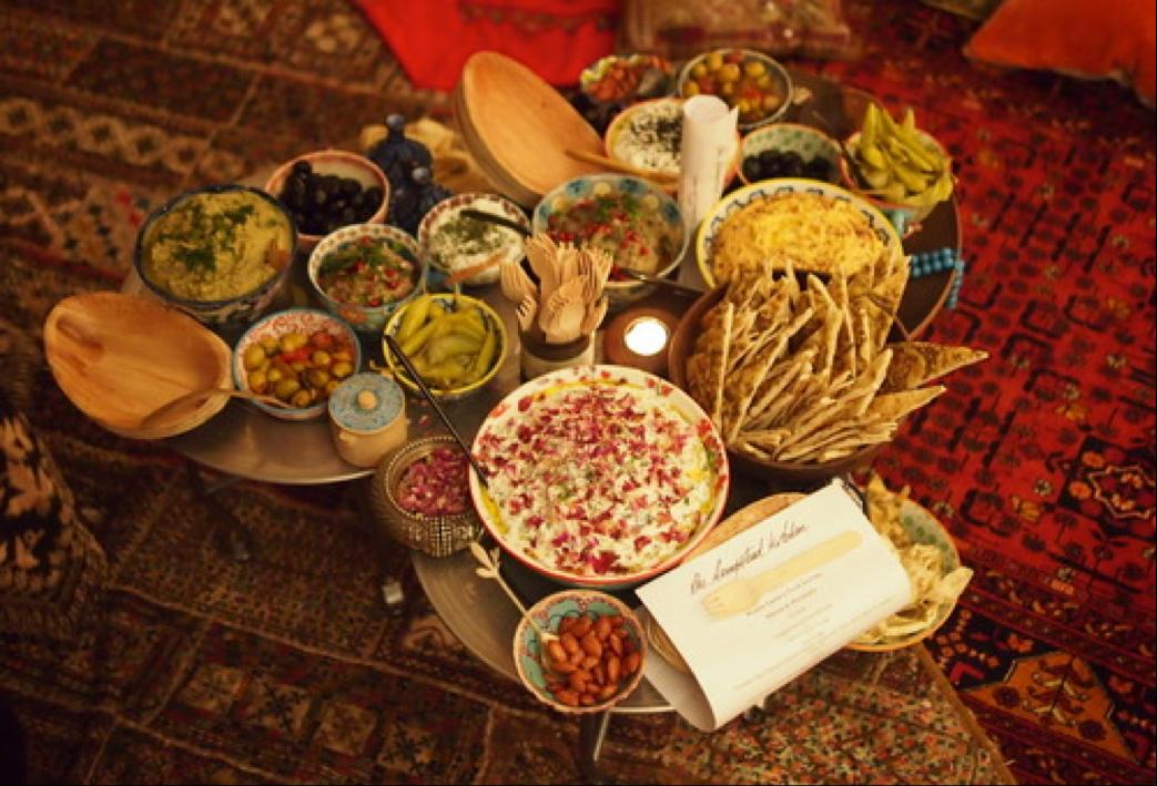 Fresh mezze spread on carpet